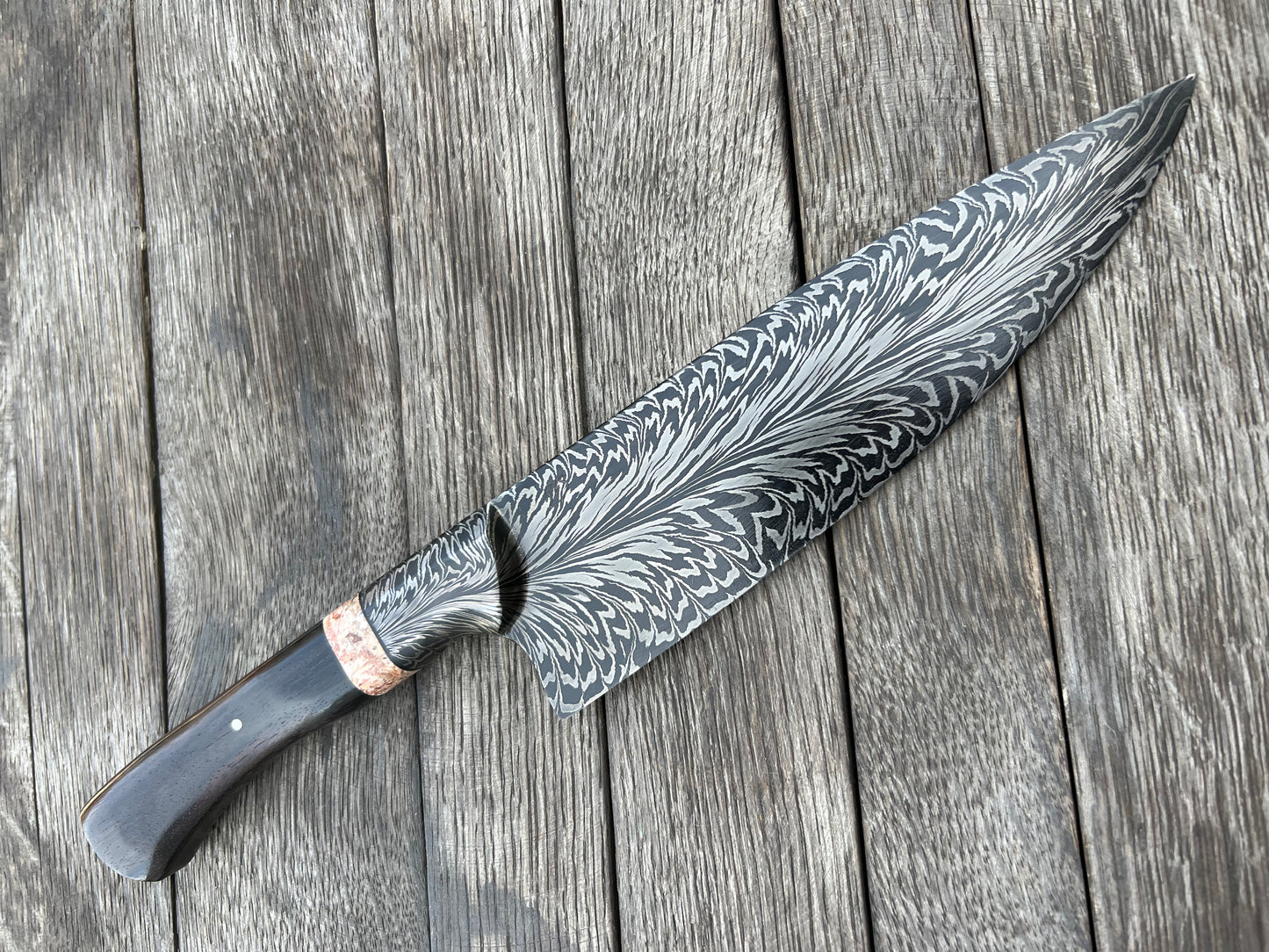 
                  
                    Integral Feather Damascus Chef
                  
                