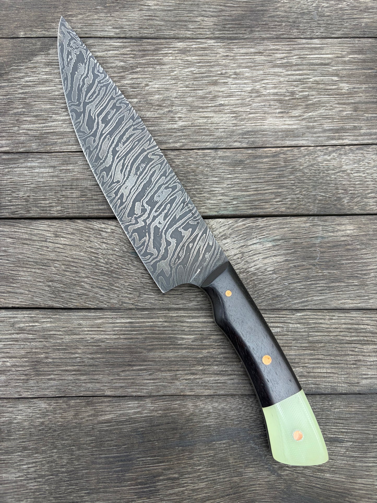 
                  
                    Twist Damascus chef knife
                  
                