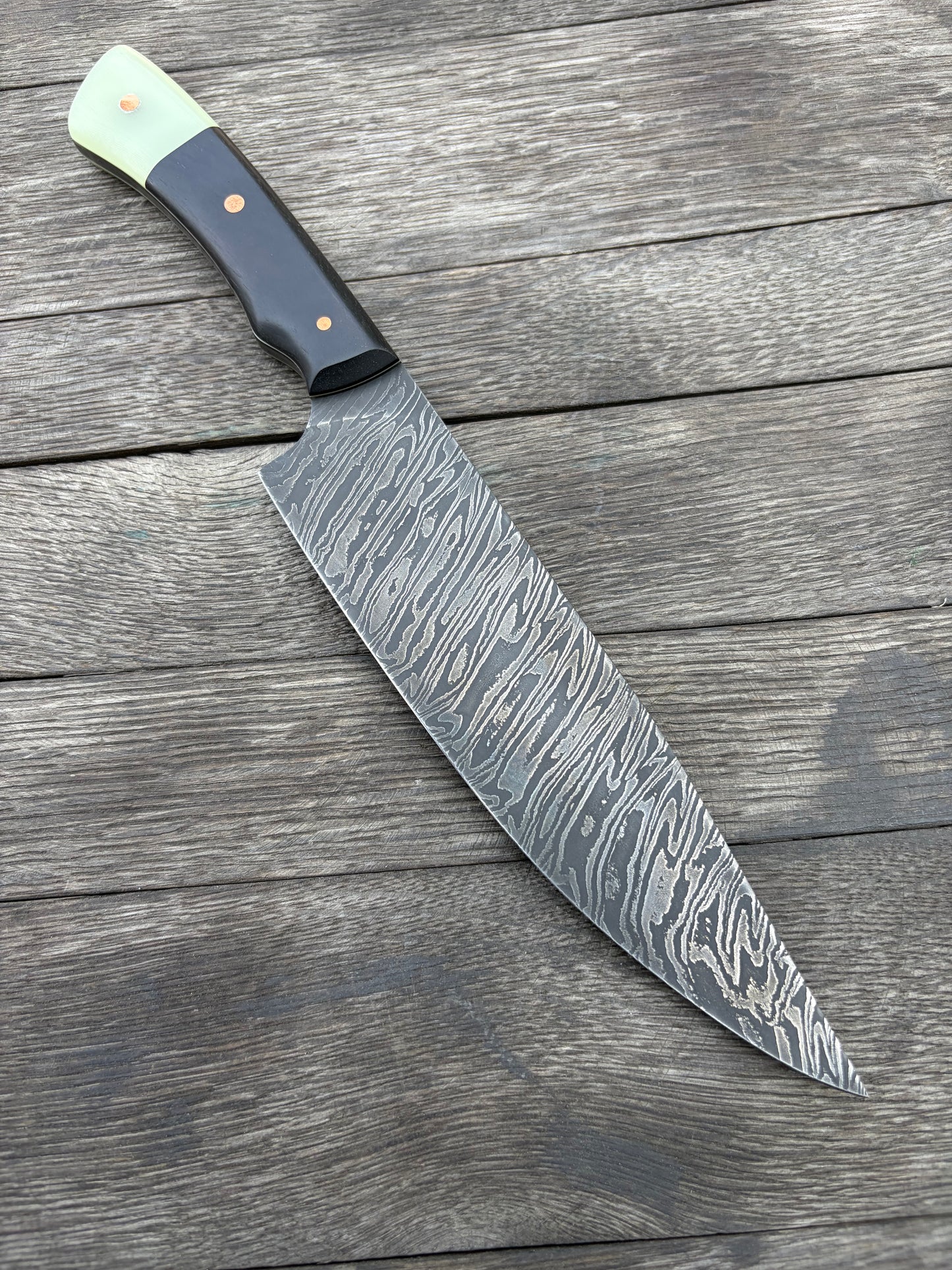 
                  
                    Twist Damascus chef knife
                  
                