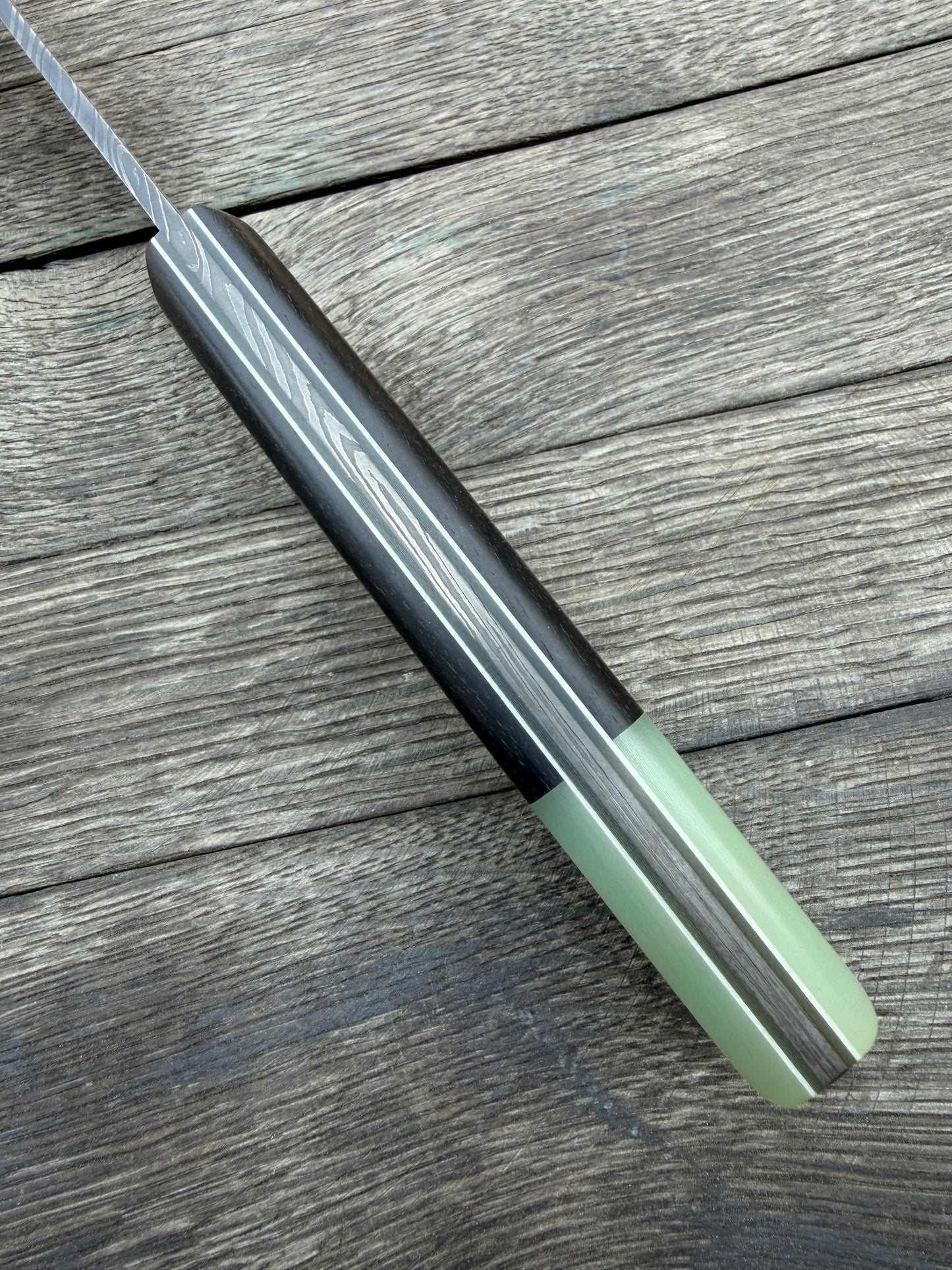 
                  
                    Twist Damascus chef knife
                  
                
