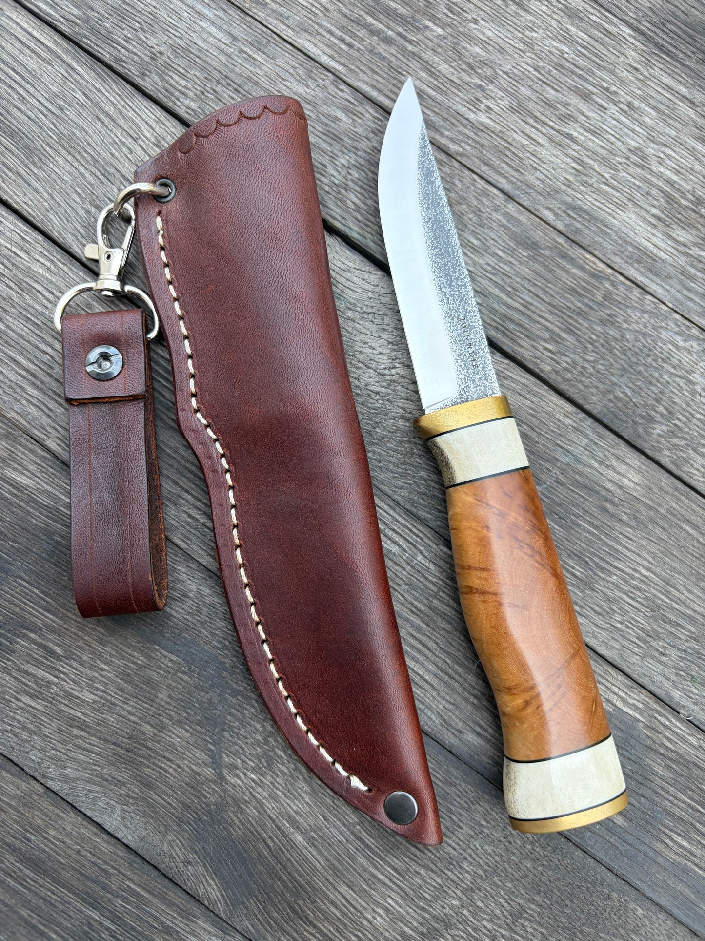 
                  
                    Puukko
                  
                
