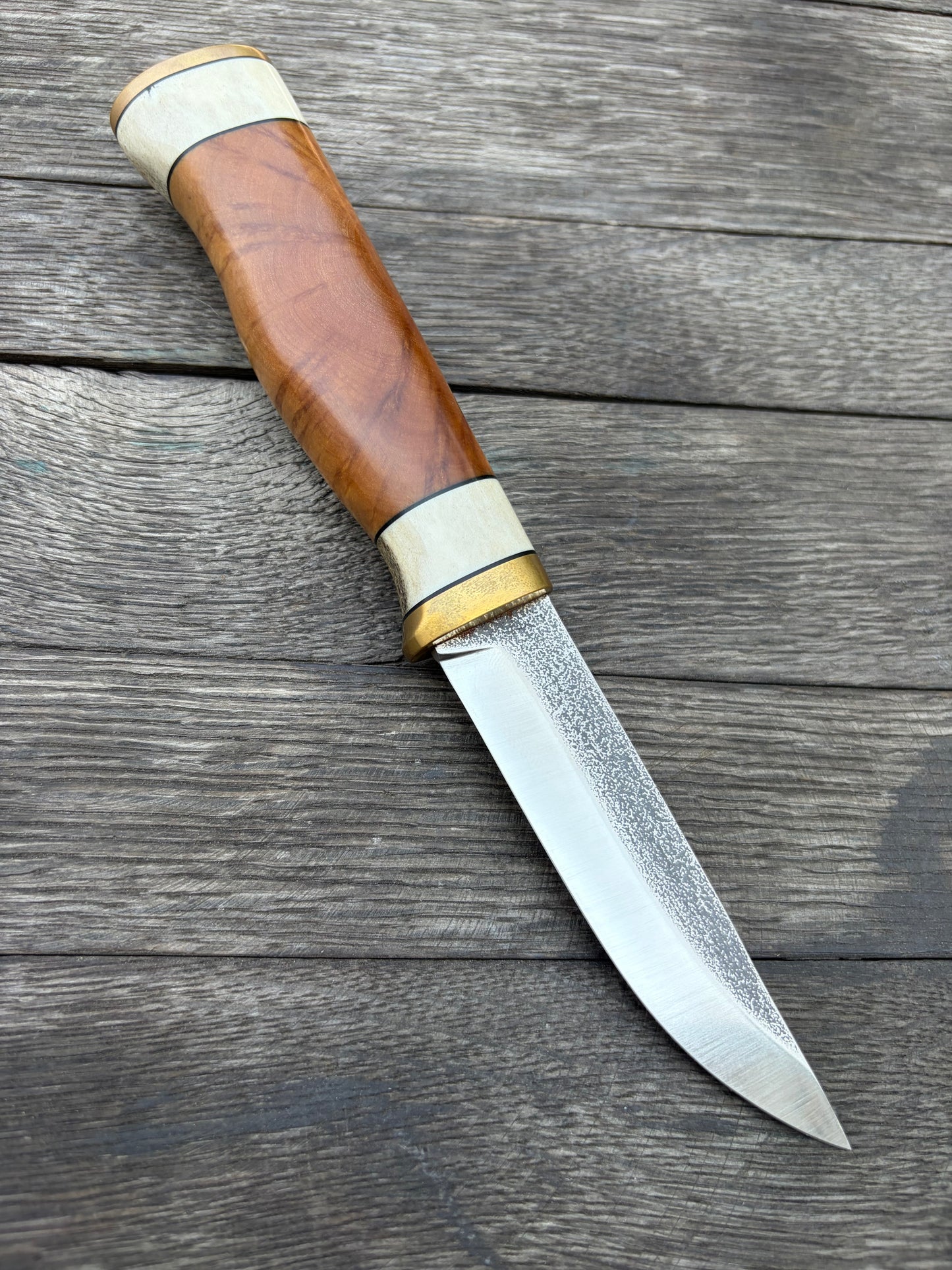 
                  
                    Puukko
                  
                